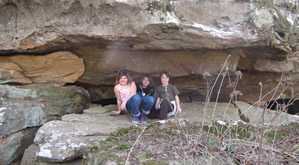 makanda rocks, children sitting under a shelter bluff common in the area