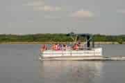 Little Grassy Lake pontoon boat on the lake in Illinois most hippie town