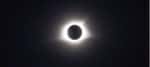 black sky of the total solar eclipse